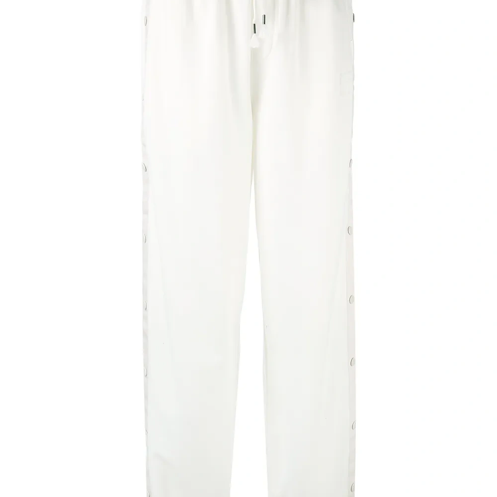 Спортивные брюки с пуговицами по бокам