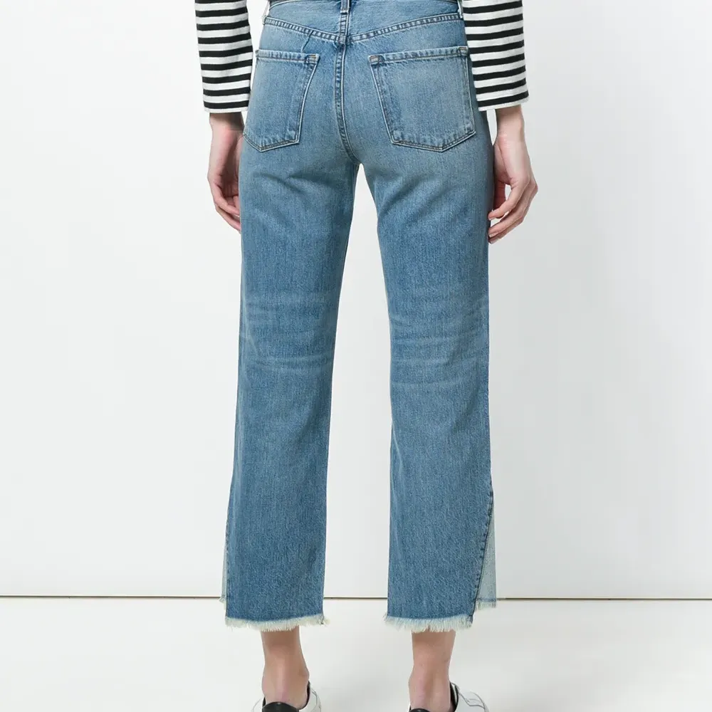 Укороченные асимметричные джинсы