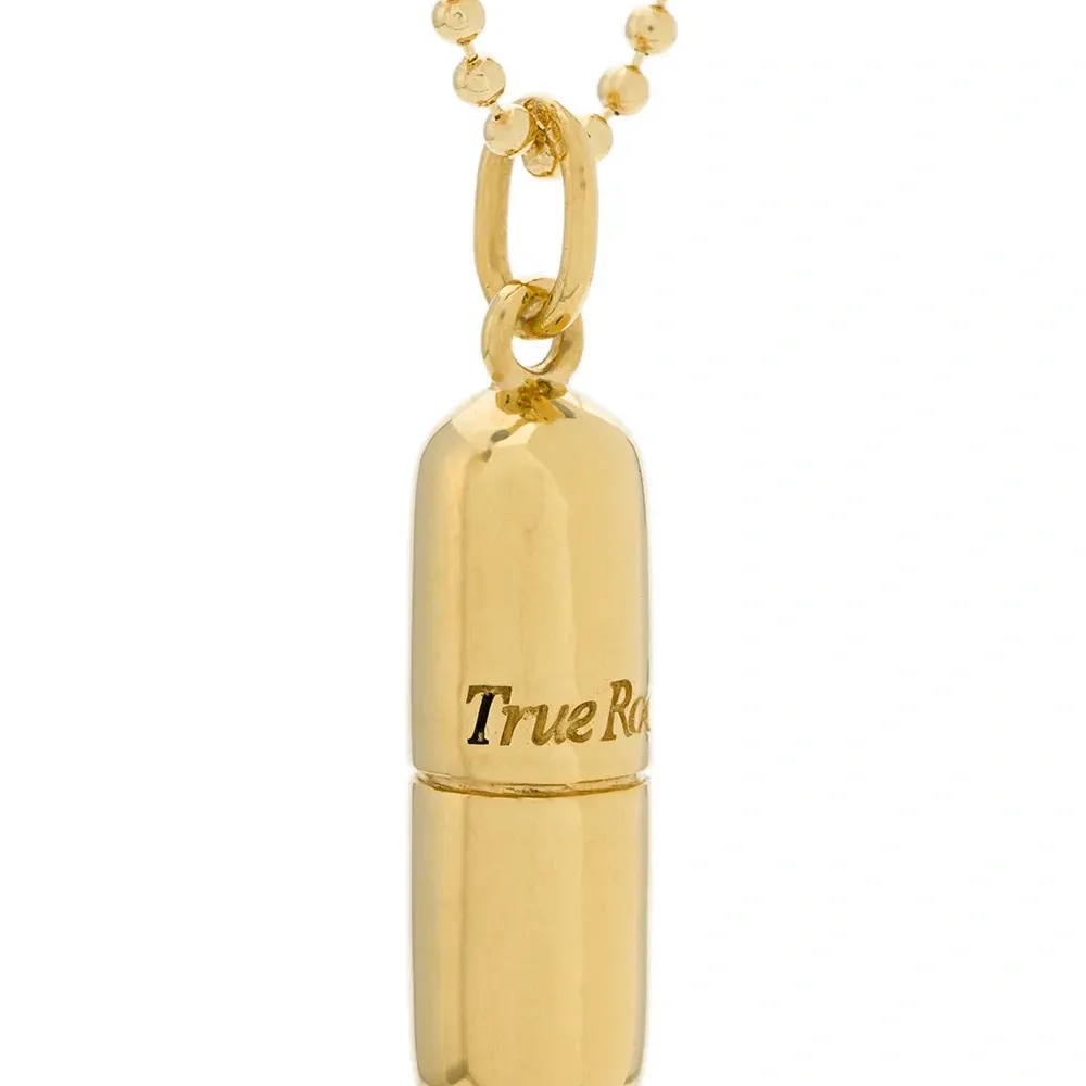 Колье с подвеской в виде пилюли