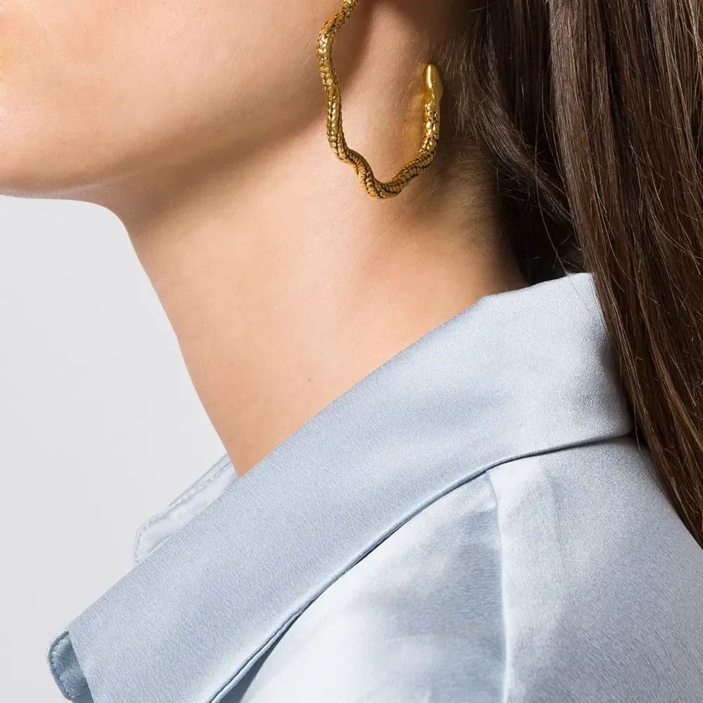 Круглые серьги в виде змеи