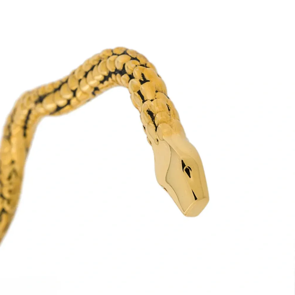 Круглые серьги в виде змеи