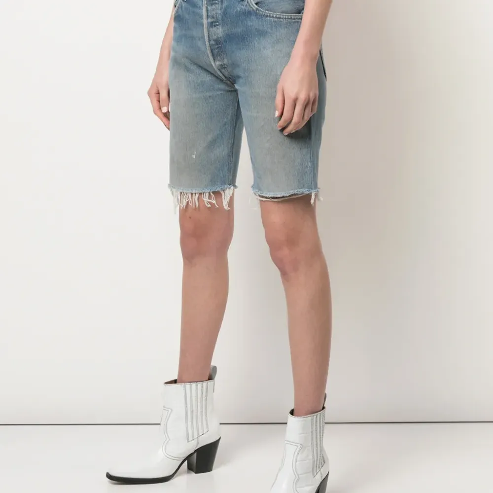 Джинсовые шорты по колено