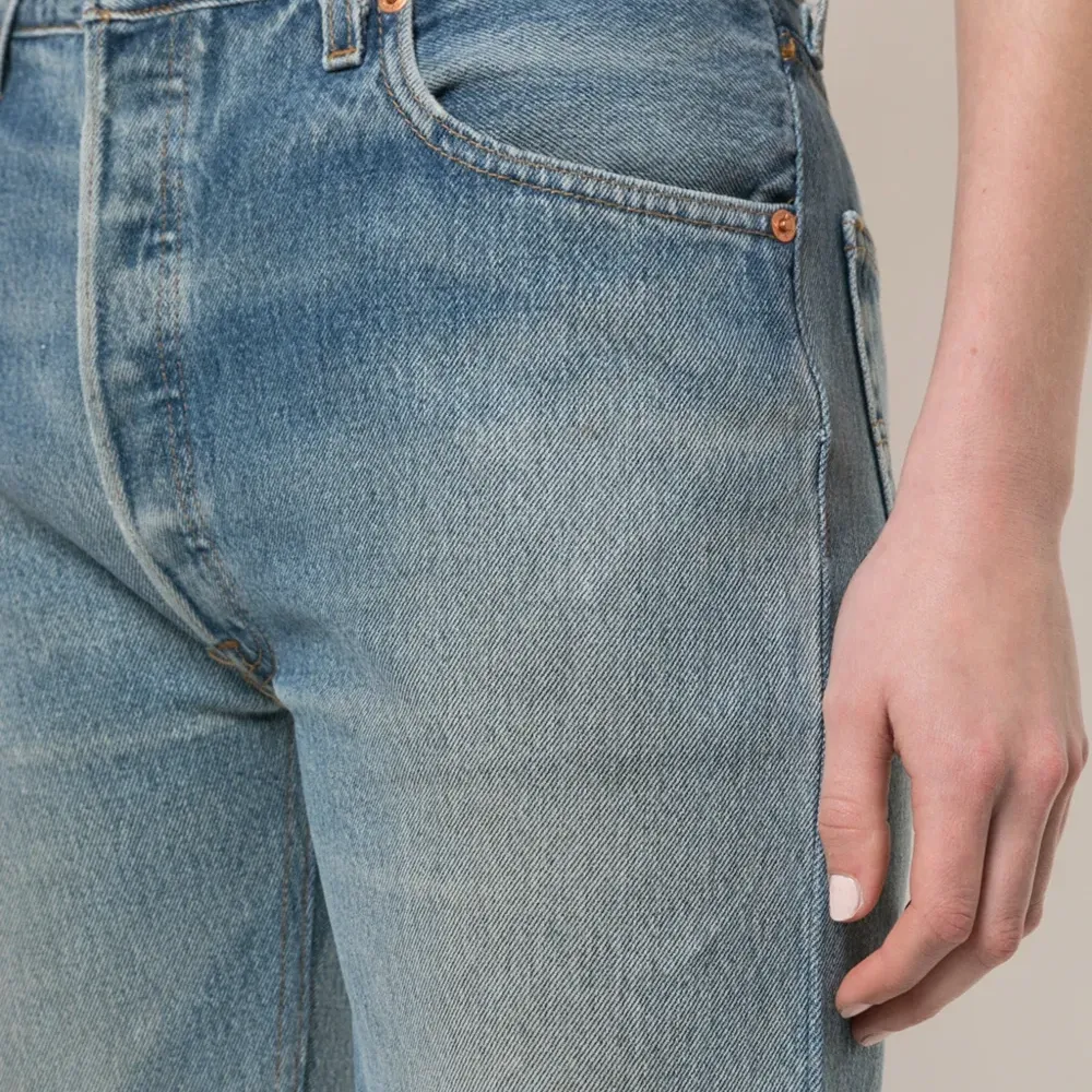 Джинсовые шорты по колено