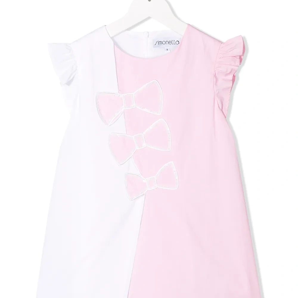 Платье с декоративными бантами