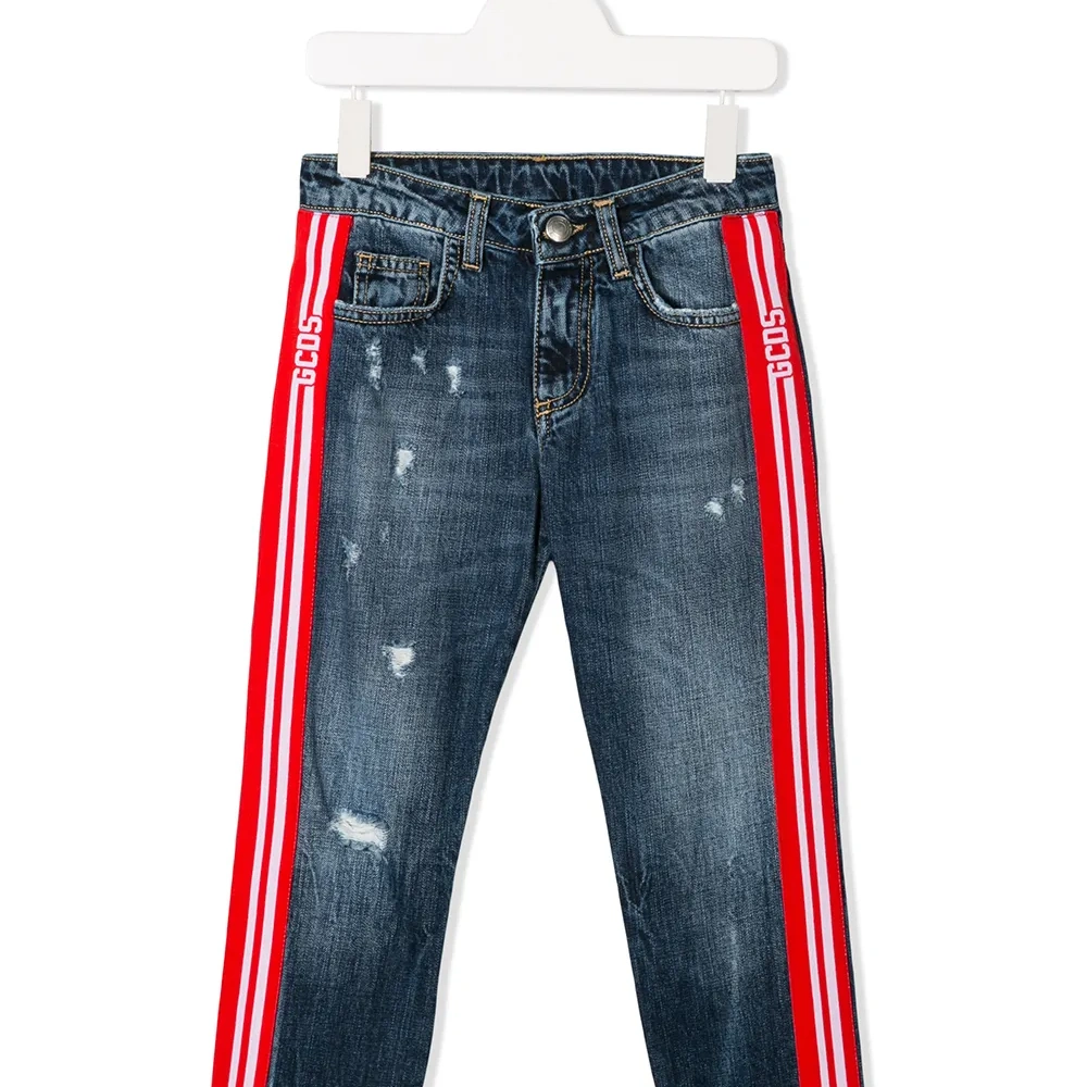 Джинсы с лампасами и эффектом потертости