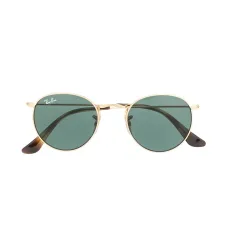 Солнцезащитные очки в круглой оправе