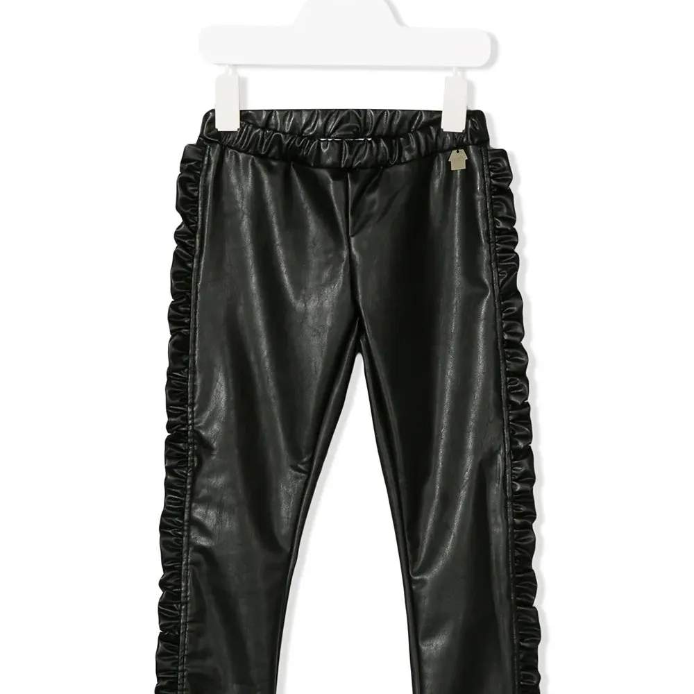 брюки с оборками