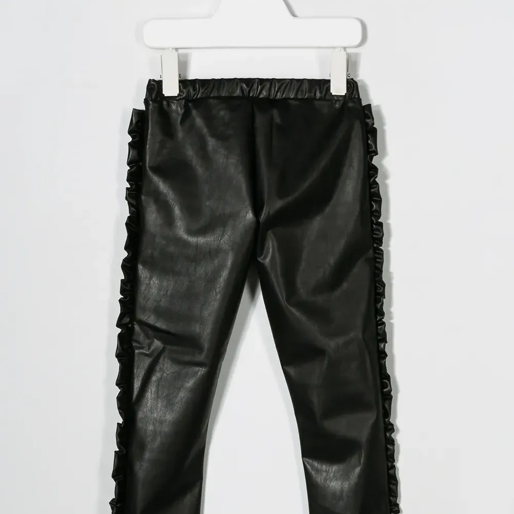 брюки с оборками