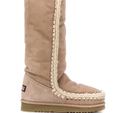 Дутые сапоги с плетением