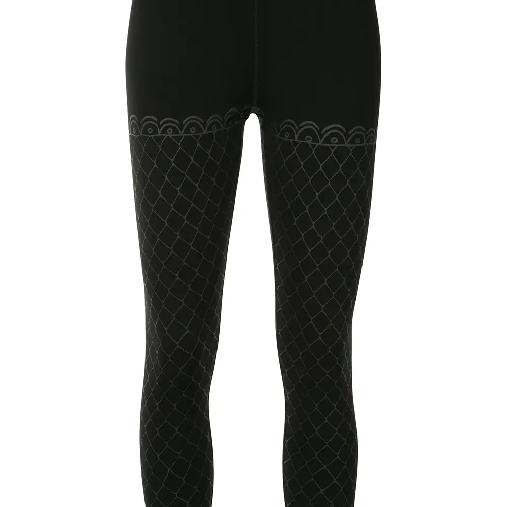 легинсы с геометричным принтом