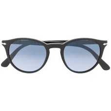 Солнцезащитные очки в круглой оправе