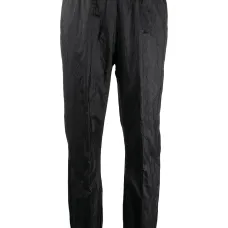 зауженные брюки с эффектом металлик