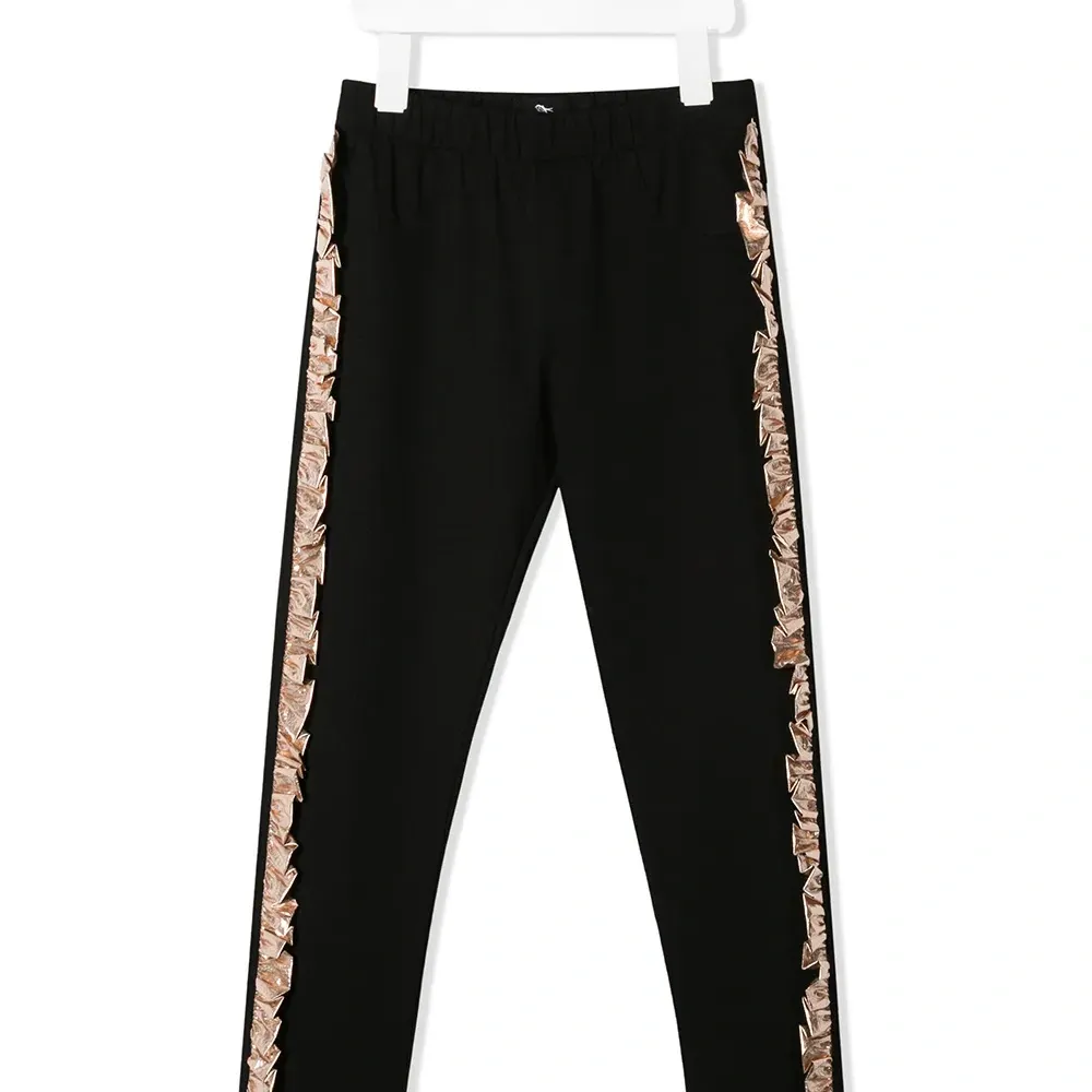 брюки с оборками