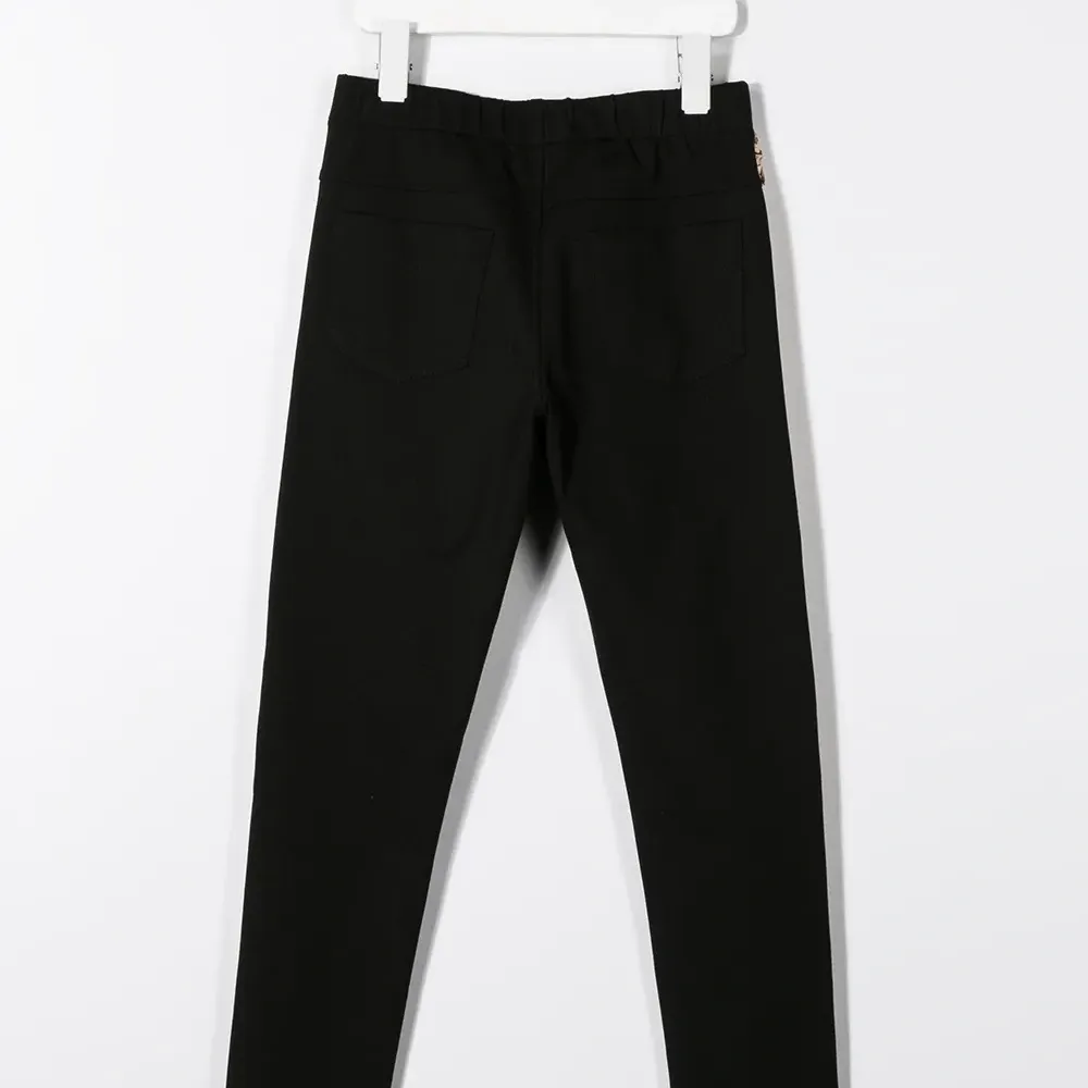 брюки с оборками