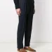 Строгие брюки кроя слим