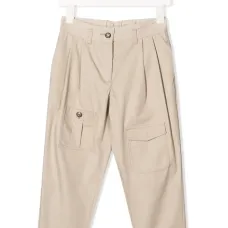 брюки с карманами и складками