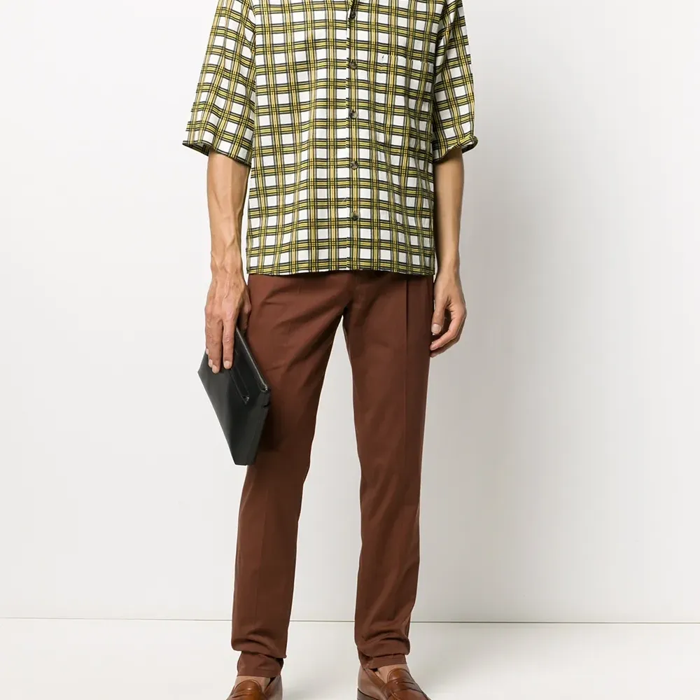 Брюки прямого кроя со складками