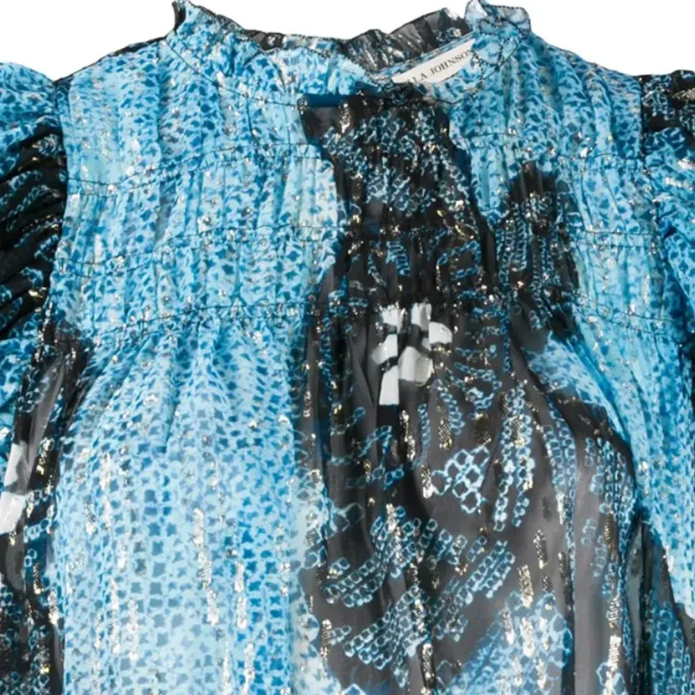 Блузка без рукавов с абстрактным принтом