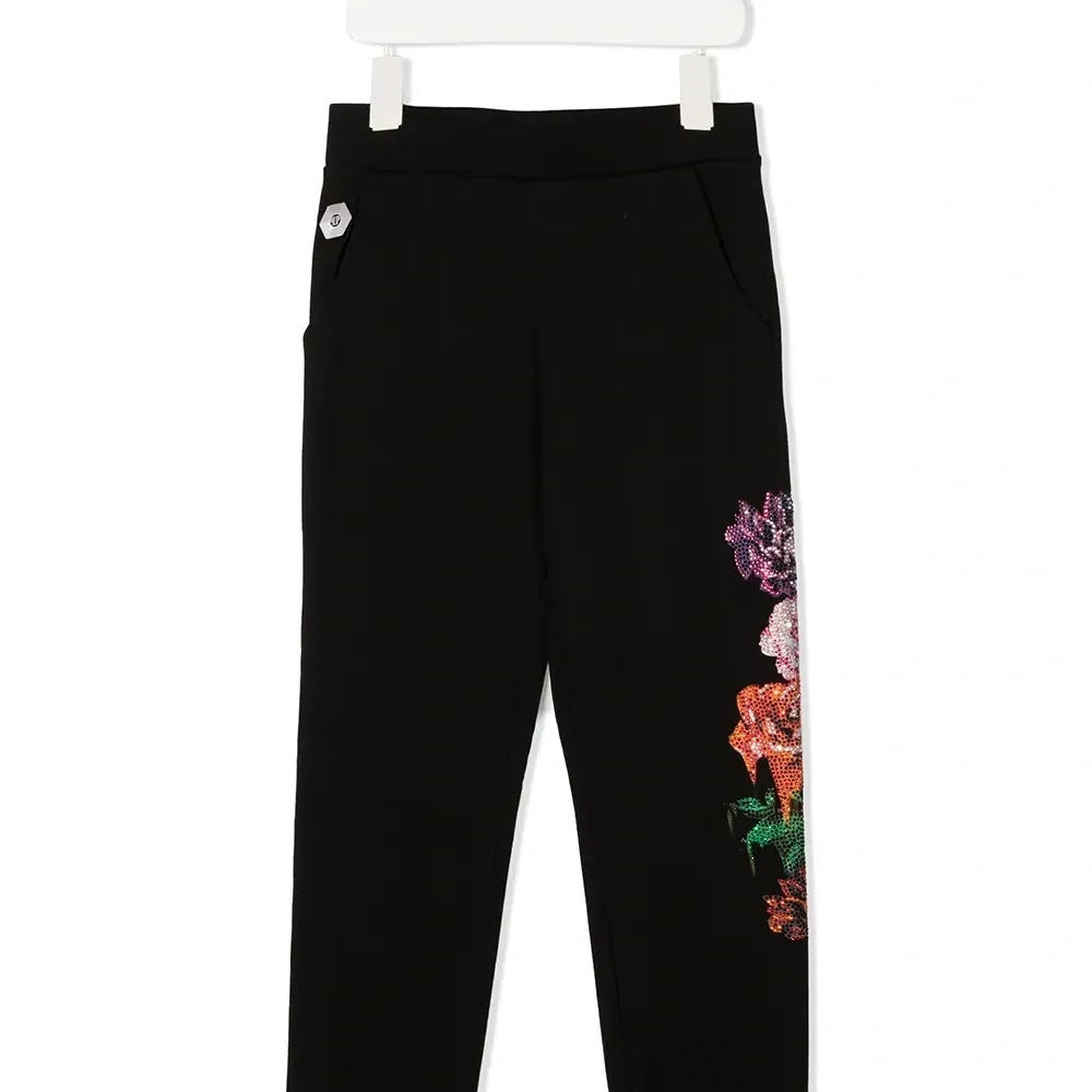Брюки с цветочным принтом и стразами