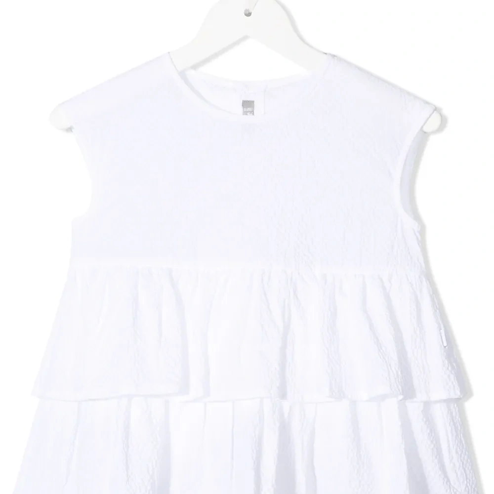 Блузка без рукавов с оборками