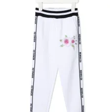 спортивные брюки с логотипами на лампасах