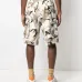 Шорты-бермуды с камуфляжным принтом