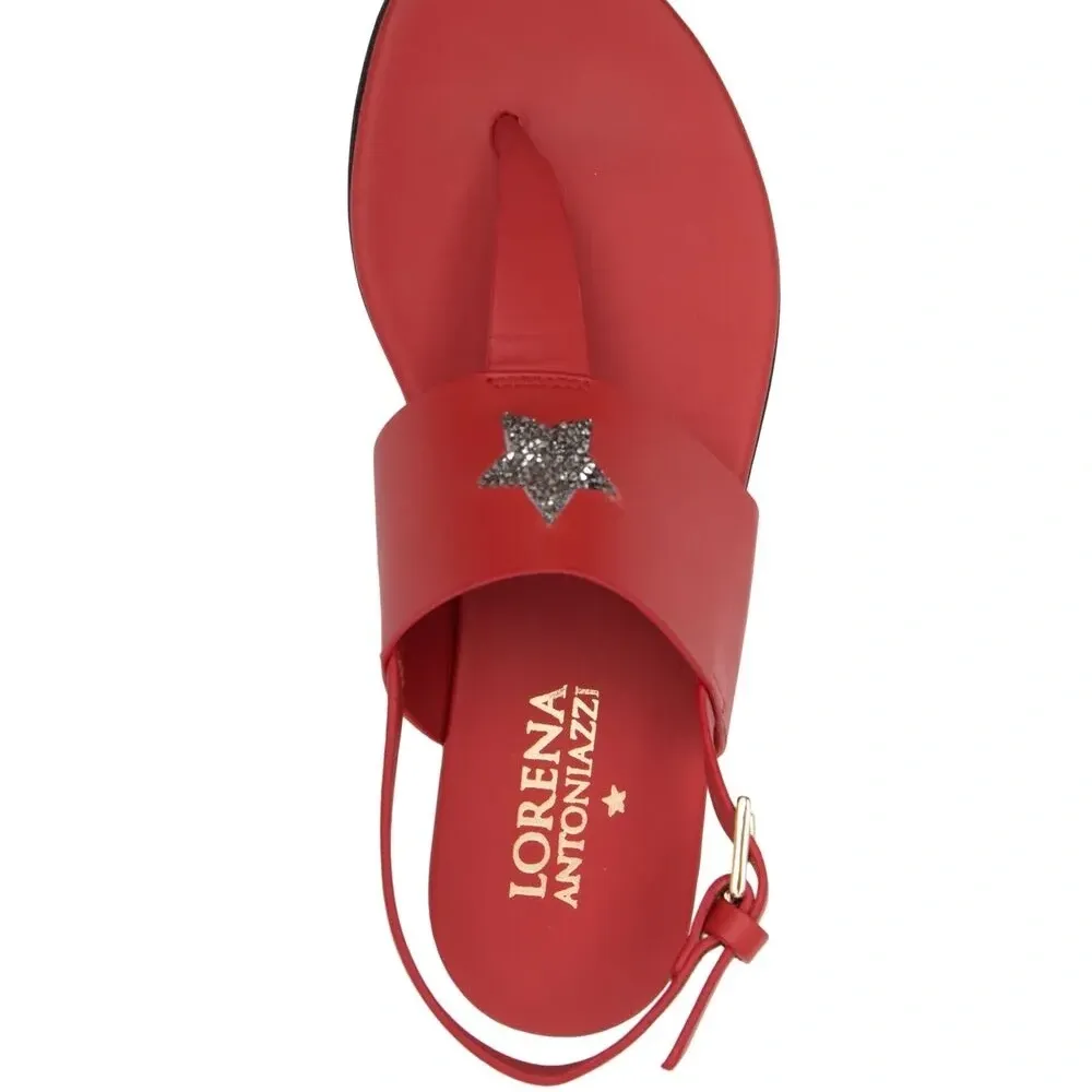 Сандалии с заклепками