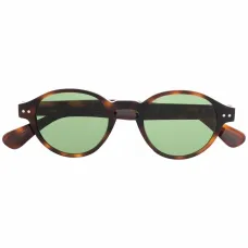 Солнцезащитные очки в круглой оправе черепаховой расцветки Солнцезащитные очки в круглой оправе черепаховой расцветки