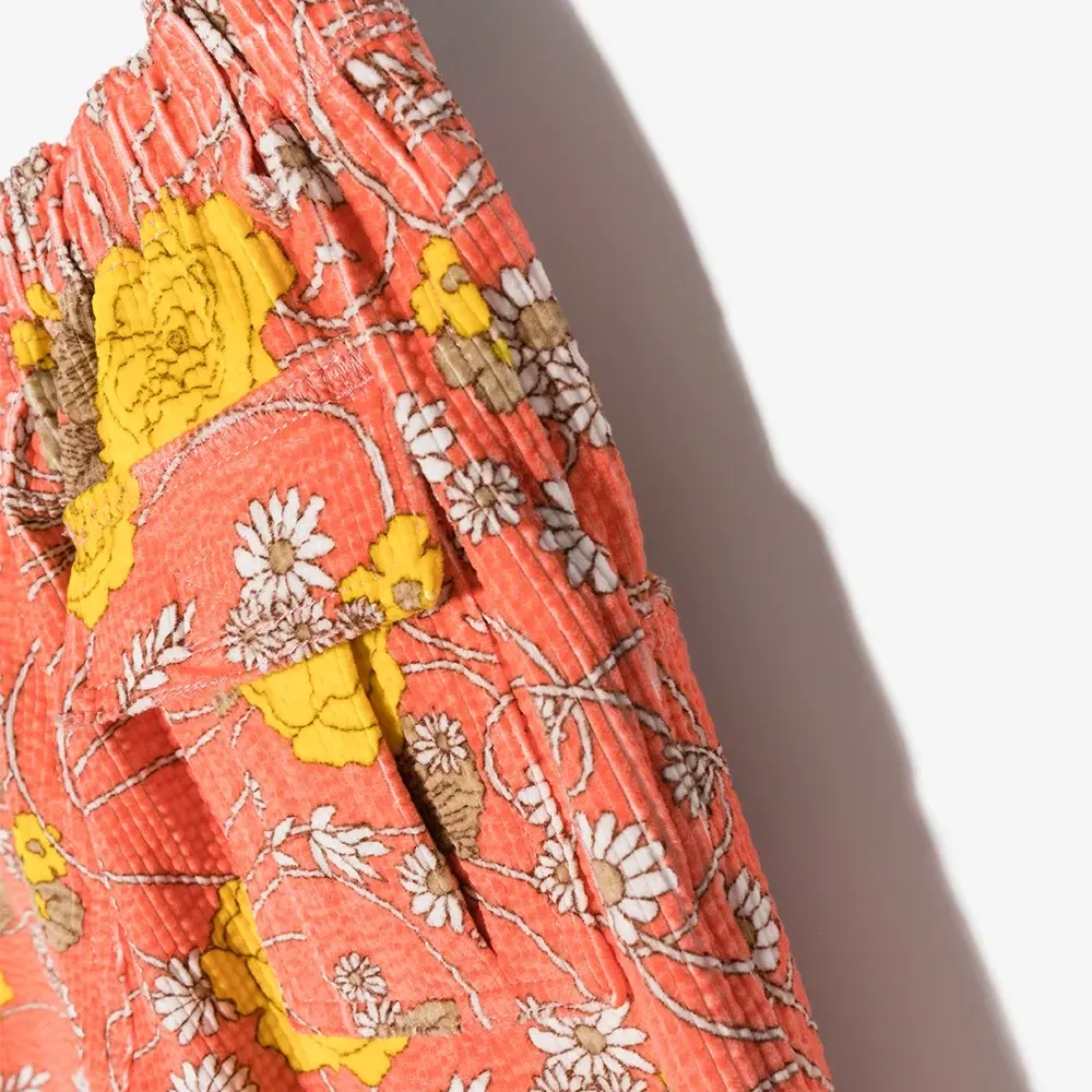 Вельветовые брюки с цветочным принтом