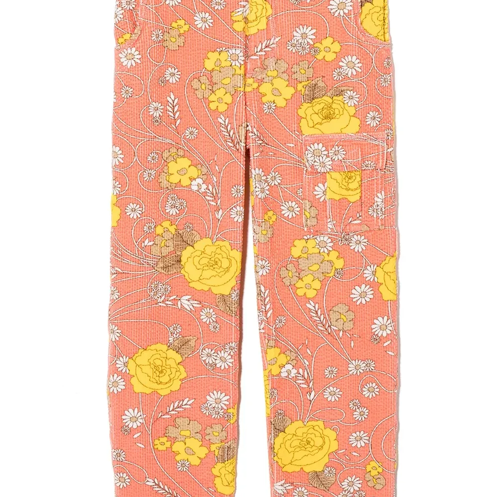 Вельветовые брюки с цветочным принтом