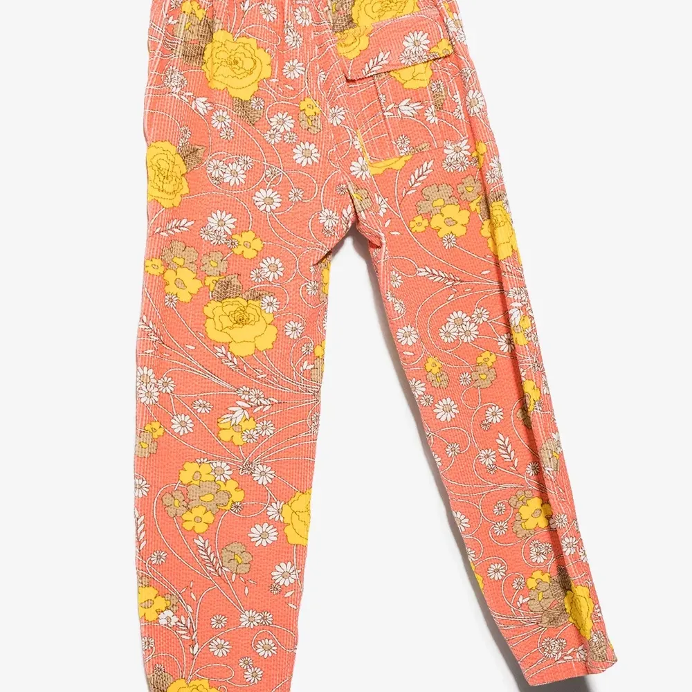 Вельветовые брюки с цветочным принтом