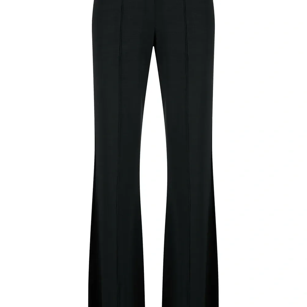 Расклешенные брюки со складками