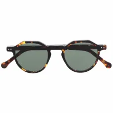 Солнцезащитные очки в круглой оправе черепаховой расцветки