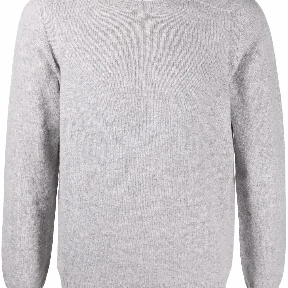 Шерстяной джемпер в рубчик