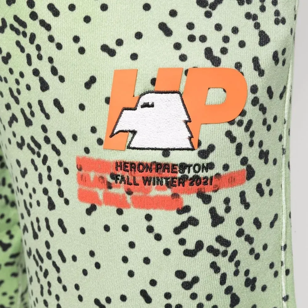 спортивные брюки с абстрактным принтом