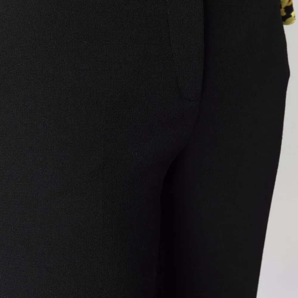 укороченные брюки строгого кроя