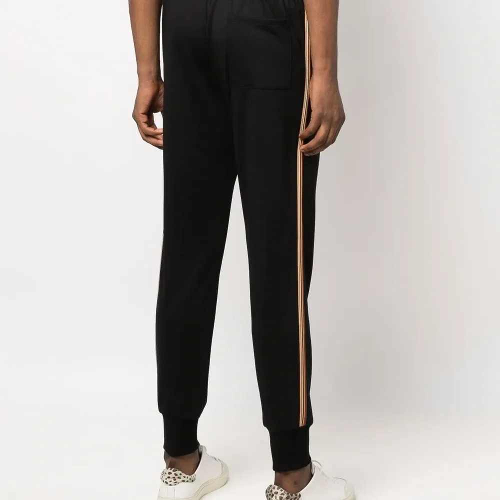 Зауженные спортивные брюки с лампасами