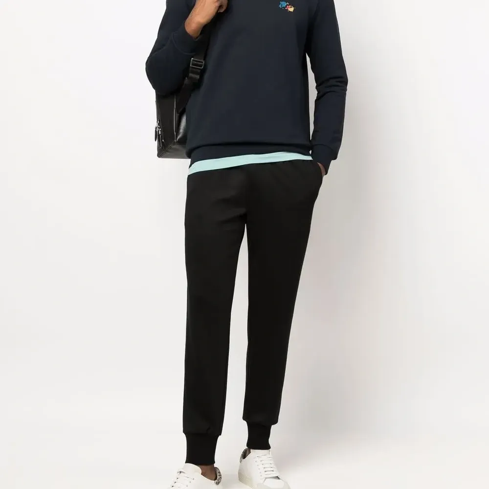 Зауженные спортивные брюки с лампасами