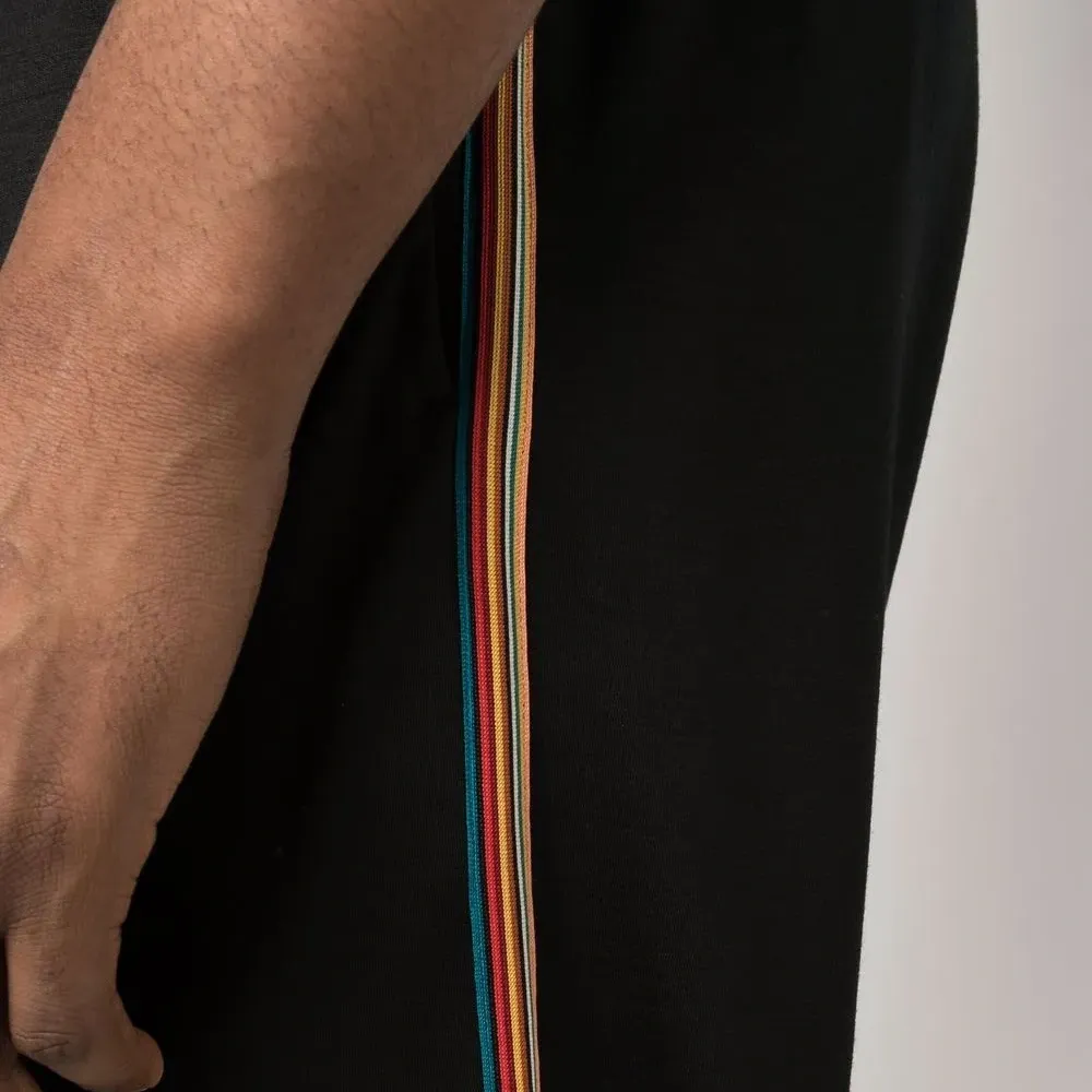 Зауженные спортивные брюки с лампасами