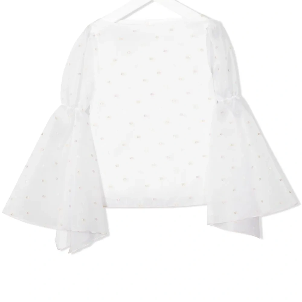 Блузка с вышивкой в горох