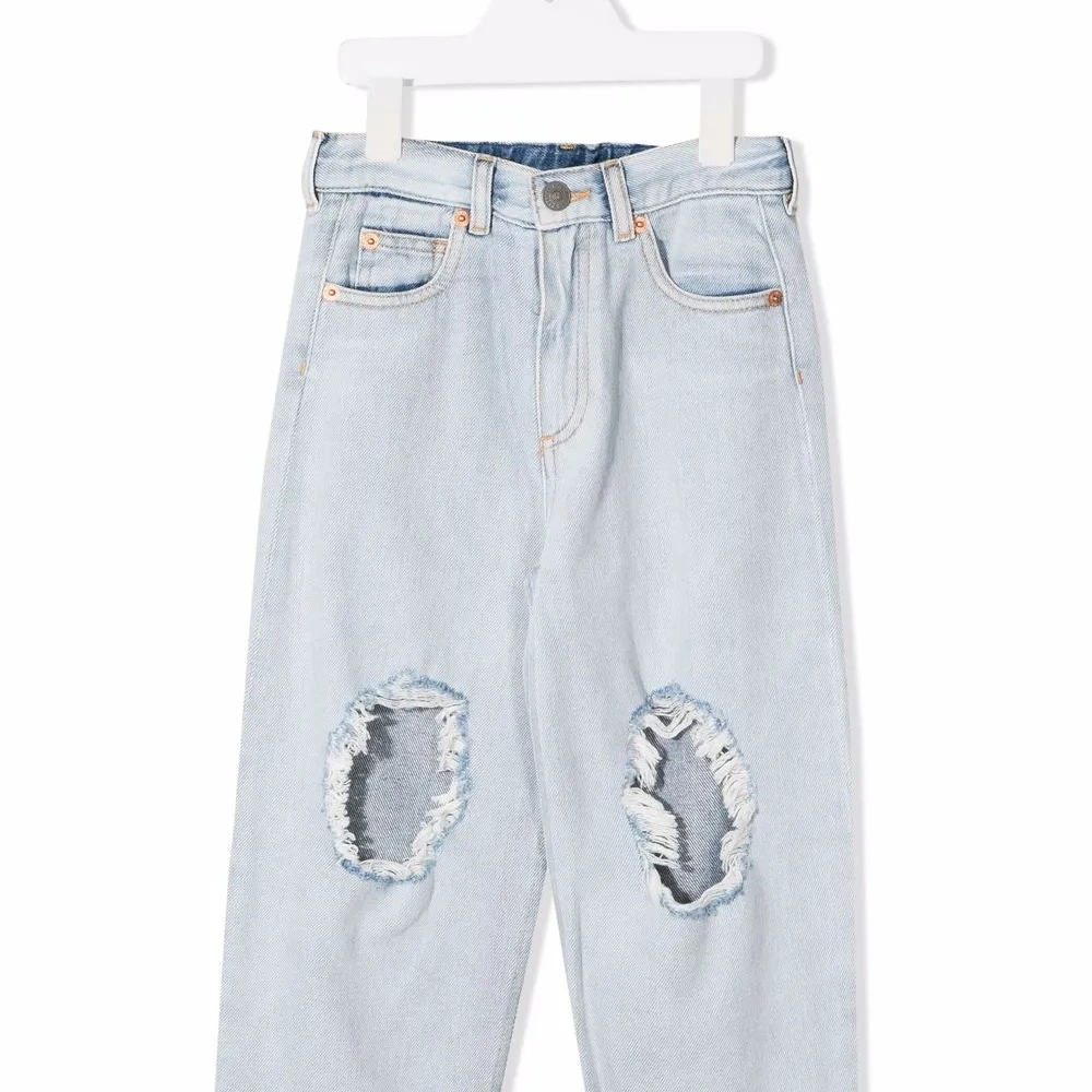 Джинсы с прорезями