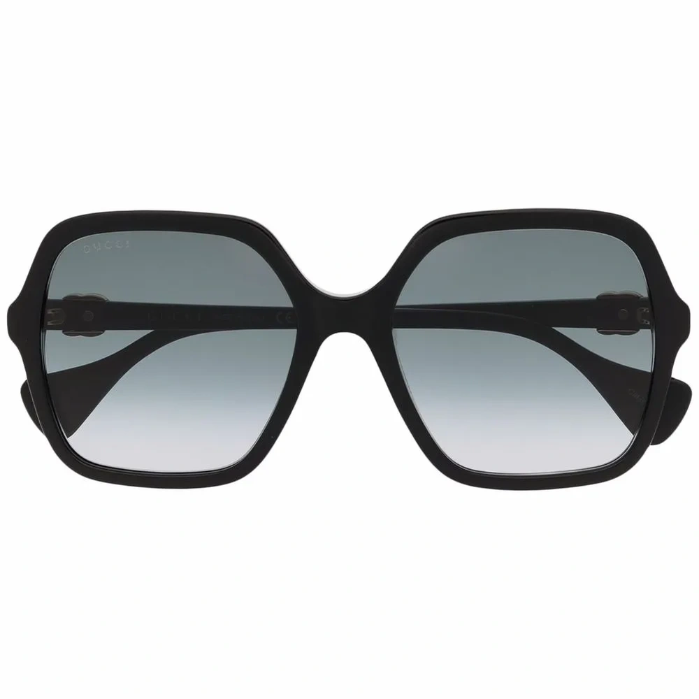 Солнцезащитные очки в массивной оправе