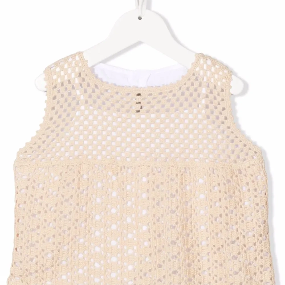 Блузка без рукавов