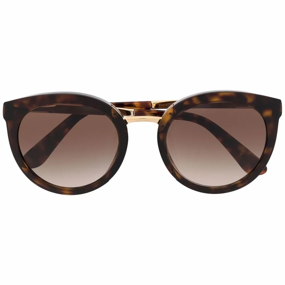 Солнцезащитные очки в круглой оправе