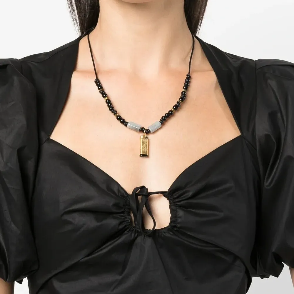 Колье с бусинами и подвеской