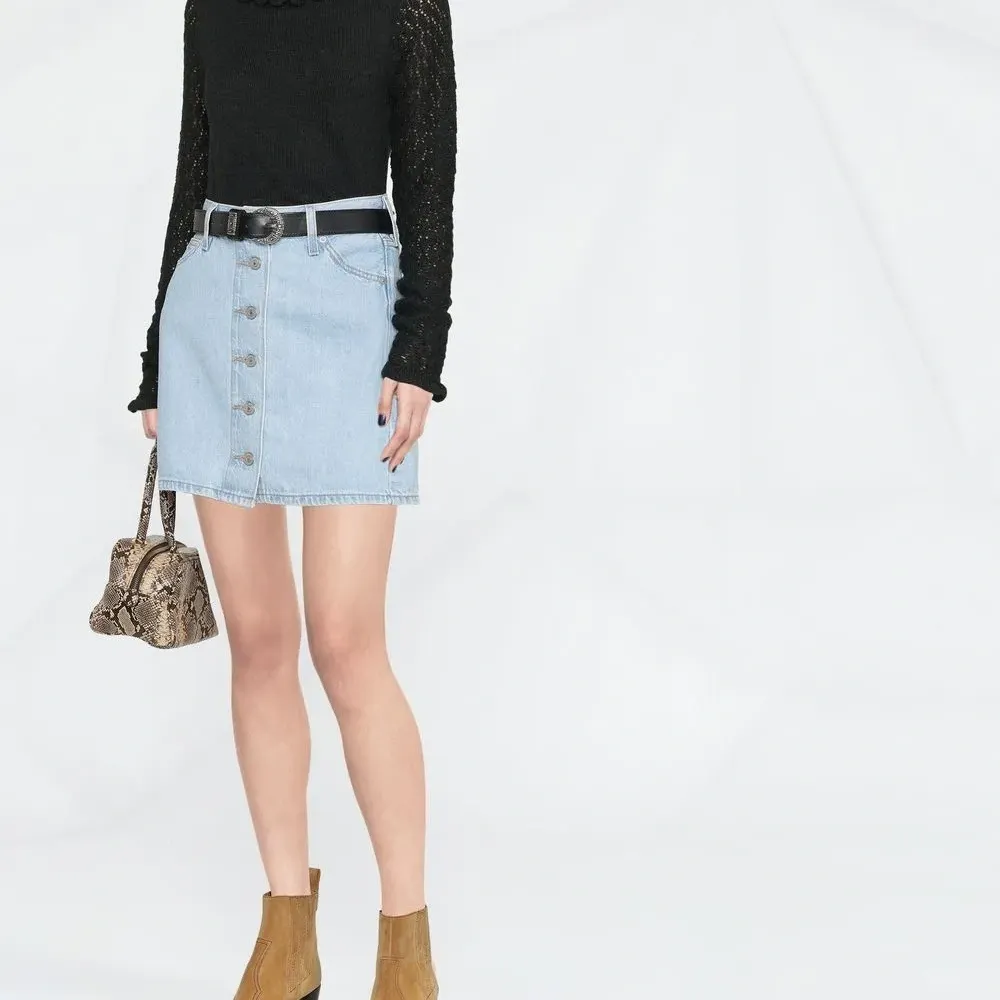 Топ тонкой вязки с фестонами