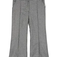 Брюки в ломаную клетку