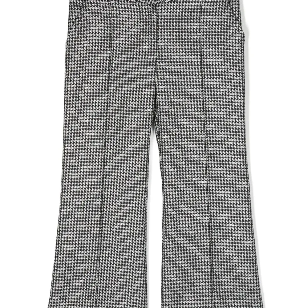 Брюки в ломаную клетку