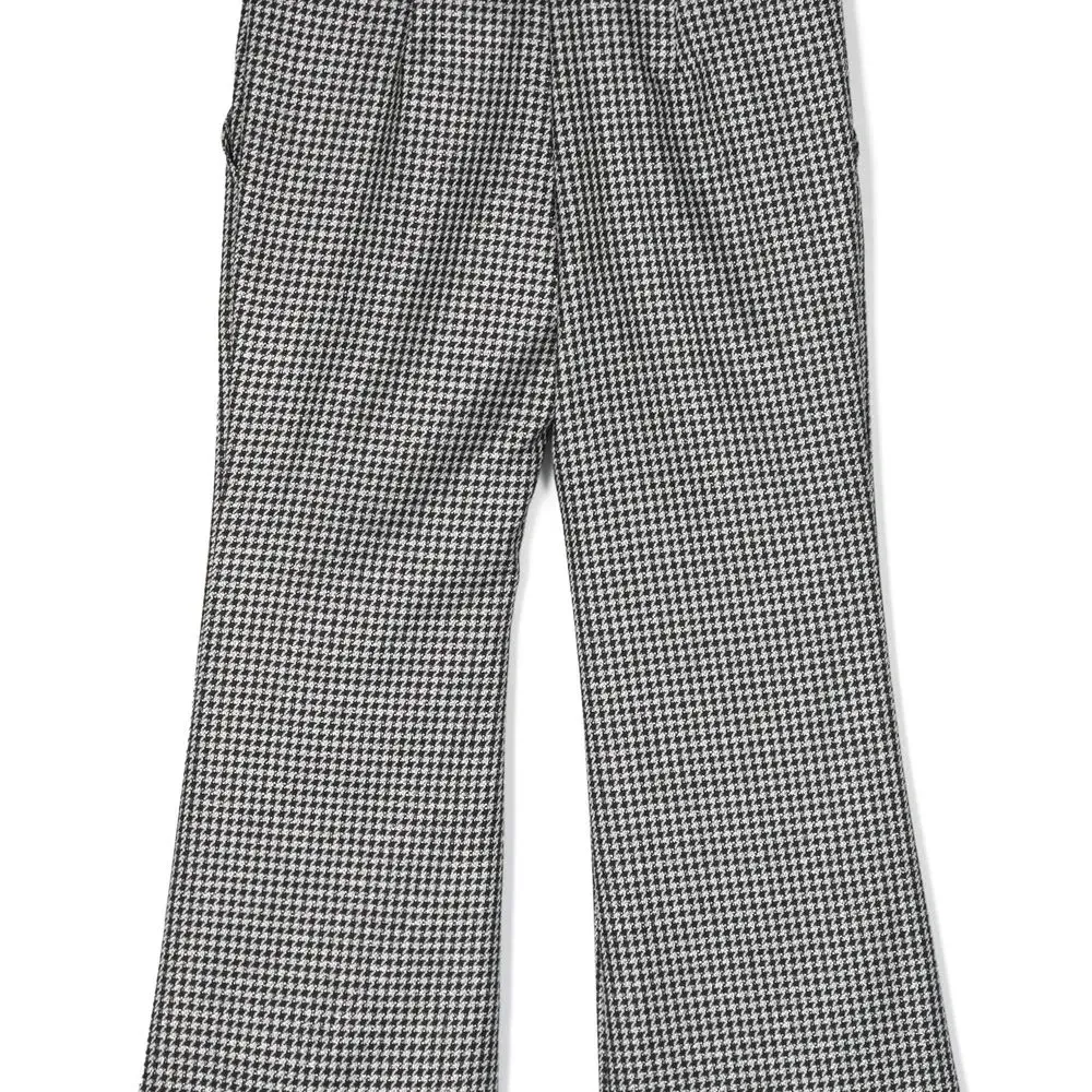 Брюки в ломаную клетку