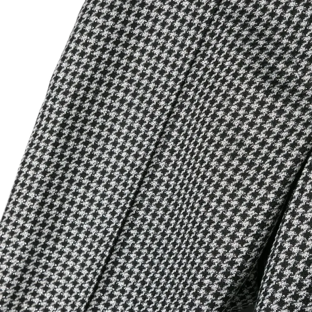 Брюки в ломаную клетку